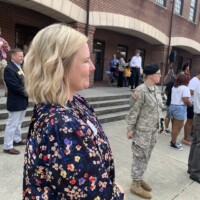 One proud mom watching a Riverside Military Academy ROC Cresting Ceremony—and probably trying very hard not to cry. Proud mother watching the ROC Cresting Ceremony at Riverside Military Academy